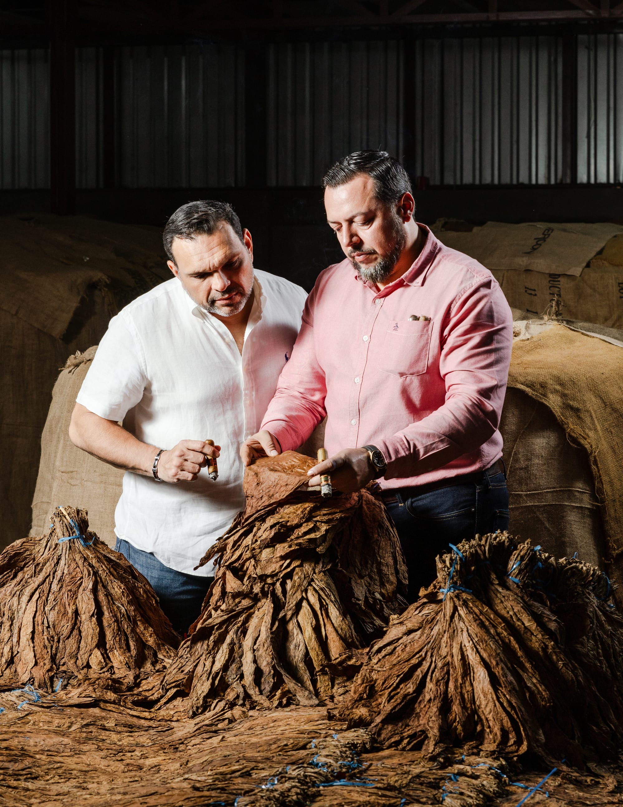 The founders inspecting tobacco leaf at the pre-industry